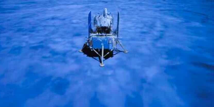 In this photo released by the Xinhua News Agency, a screen shows the Chang'e-5 spacecraft that has landed and a photo of the moon's surface, below, taken by camera aboard the Chang'e-5 spacecraft. e-5 during its landing process, at the Beijing Aerospace Control Center (BACC) in Beijing on Tuesday, December 1, 2020. A Chinese spacecraft landed on the moon on Tuesday to bring moon rocks back to Earth for the first time since the 1970s, the government announced. (AP)