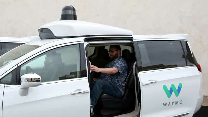 First pilot Alex Hoffman seen inside a Waymo autonomous vehicle at a protest in Chandler, Ariz. (File photo) (REUTERS)